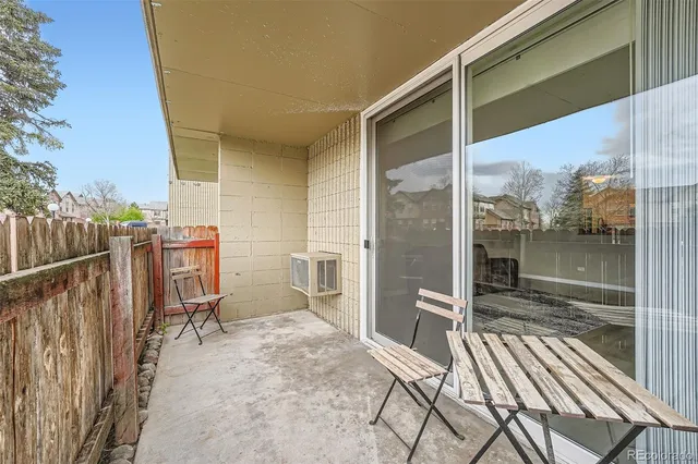 a view of a balcony with chair