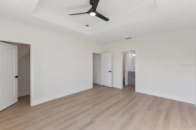 a bathroom with a double vanity sink and mirror