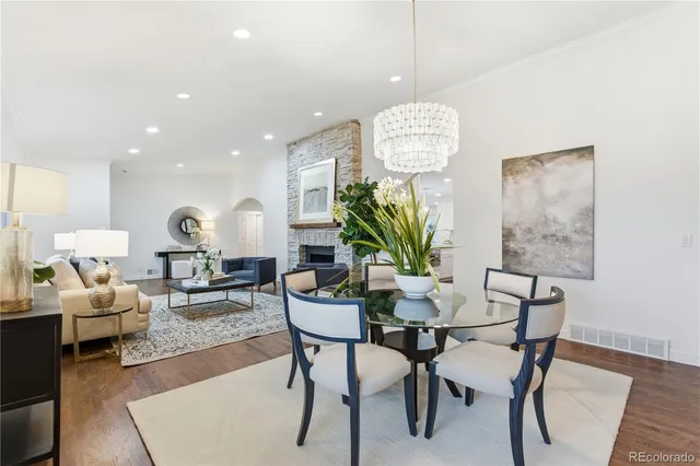 a view of a dining room with furniture and window