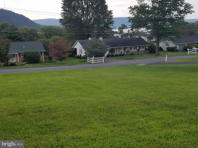 a view of a house with a big yard