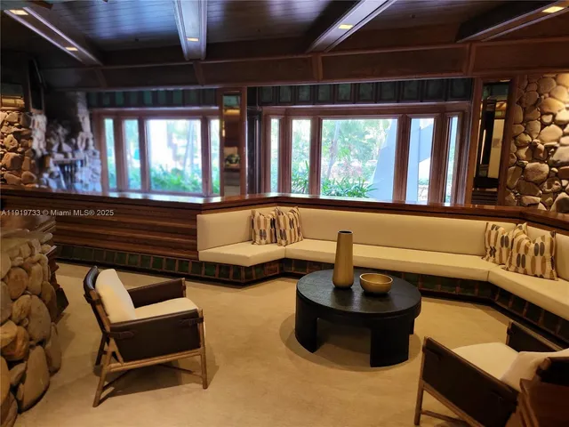 a view of a chairs and table in a patio