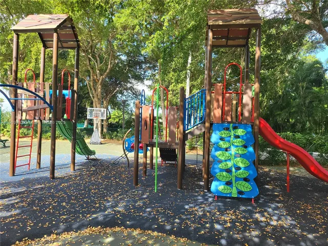a view of deck with wooden floor and fence