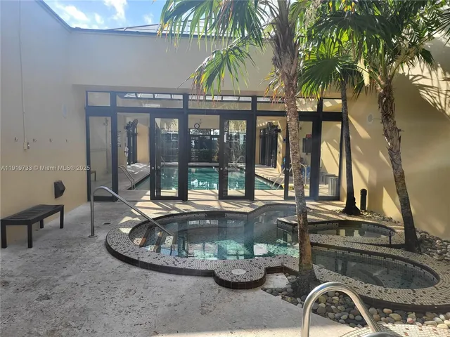 a stove top oven sitting on top of a kitchen