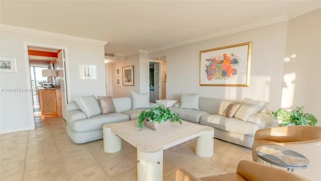 a living room with furniture and a gate