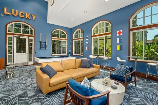 a kitchen with a table and chairs in it