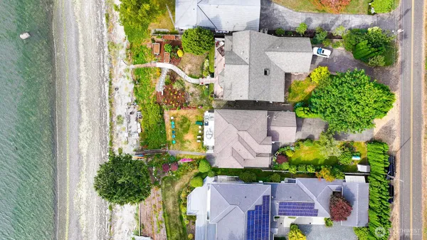 an aerial view of a house with a garden
