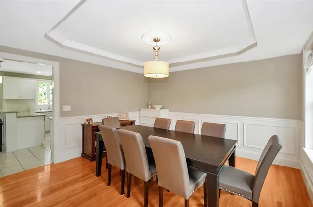 a view of a patio with couches chairs and a yard