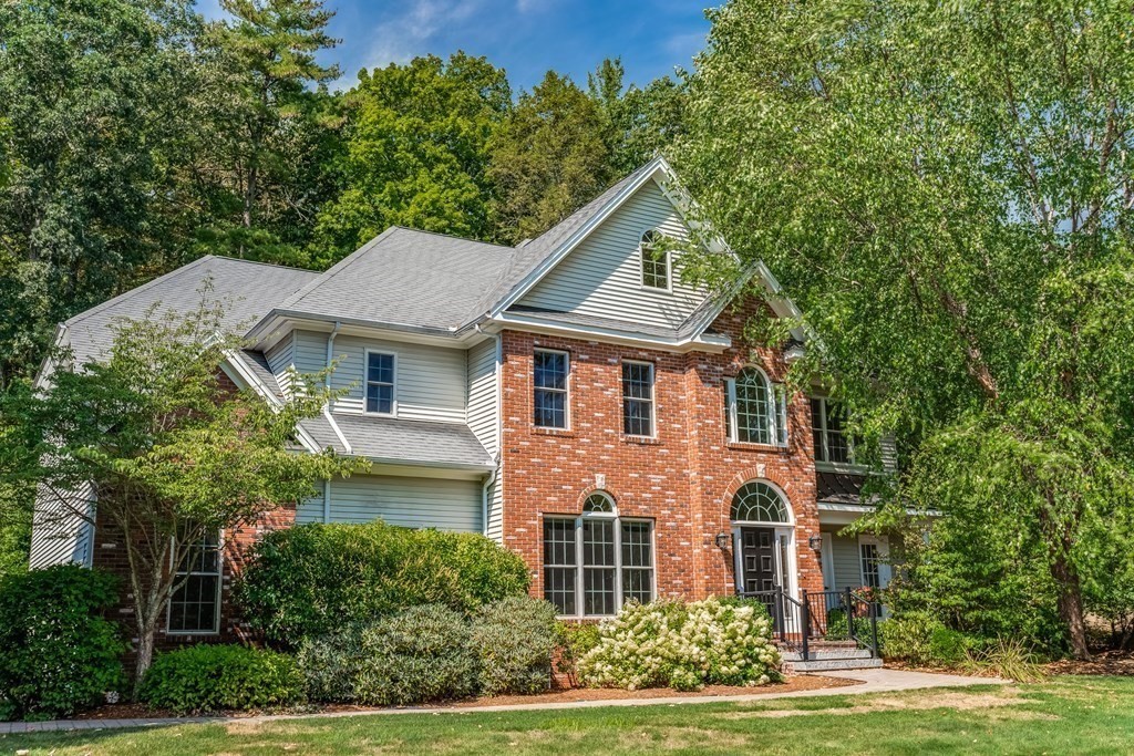 51 Linseed Road Northampton, MA 01060 - Photo 1 of 42 a front view of a house with a garden