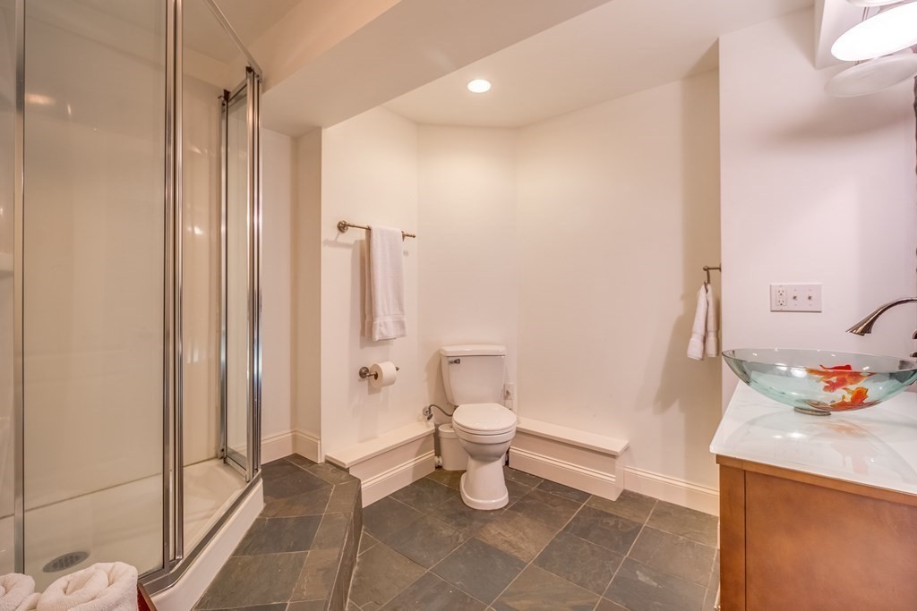 51 Linseed Road Northampton, MA 01060 - Photo 38 of 42 a bathroom with a toilet and a shower