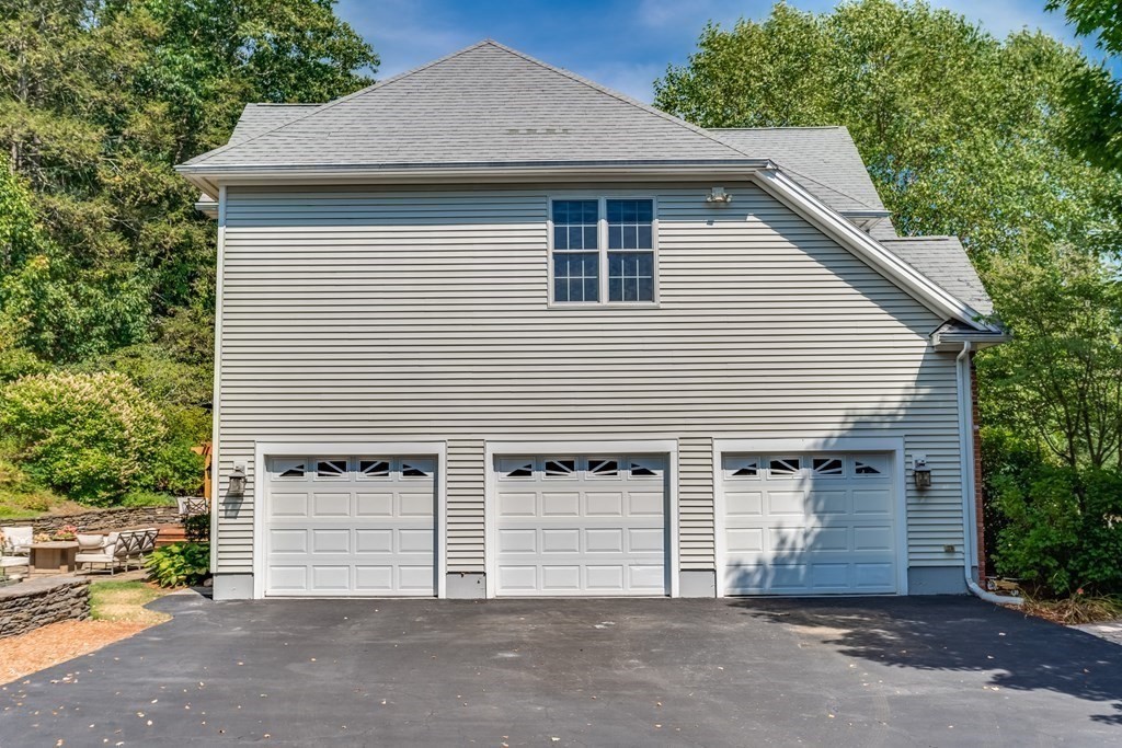 51 Linseed Road Northampton, MA 01060 - Photo 4 of 42 a front view of a house with a garage