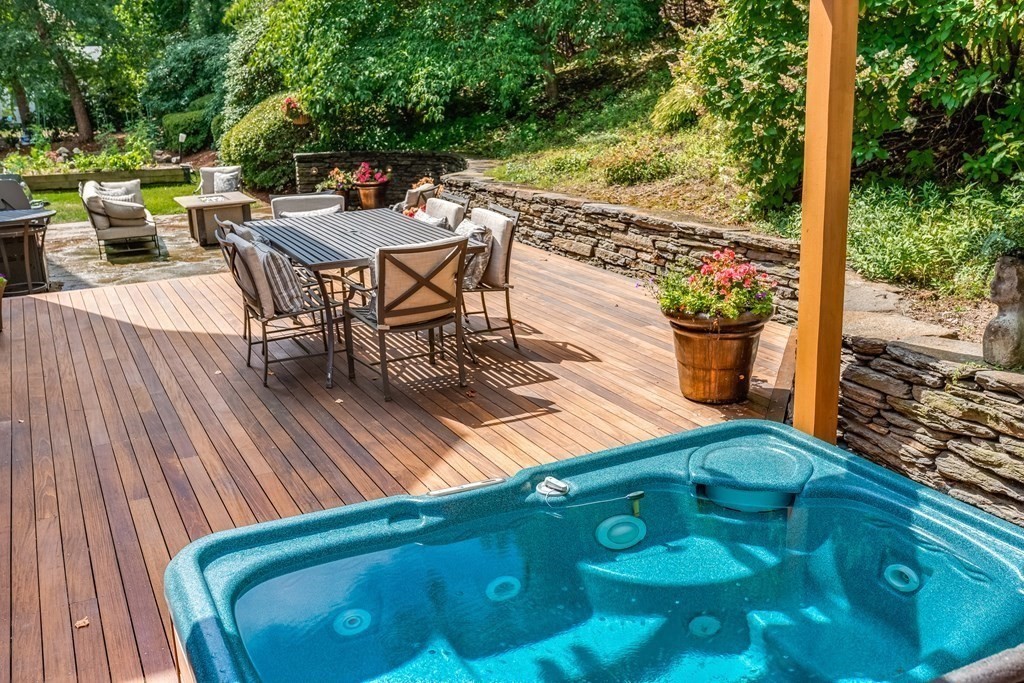 51 Linseed Road Northampton, MA 01060 - Photo 7 of 42 a view of a patio with table and chairs potted plants with wooden floor