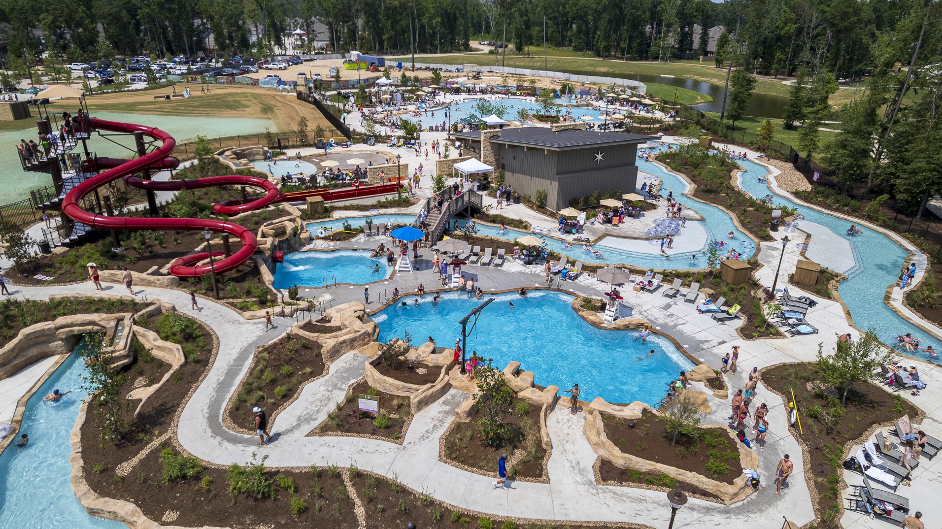 21952 Rolling Grns Road Porter, TX 77365 - Photo 16 of 16 Make a splash at Discovery Cove—the brand-new resort-style pool in The Highlands. Featuring waterslides, splash zones, and plenty of lounge space, it’s the ultimate destination for fun and relaxation.