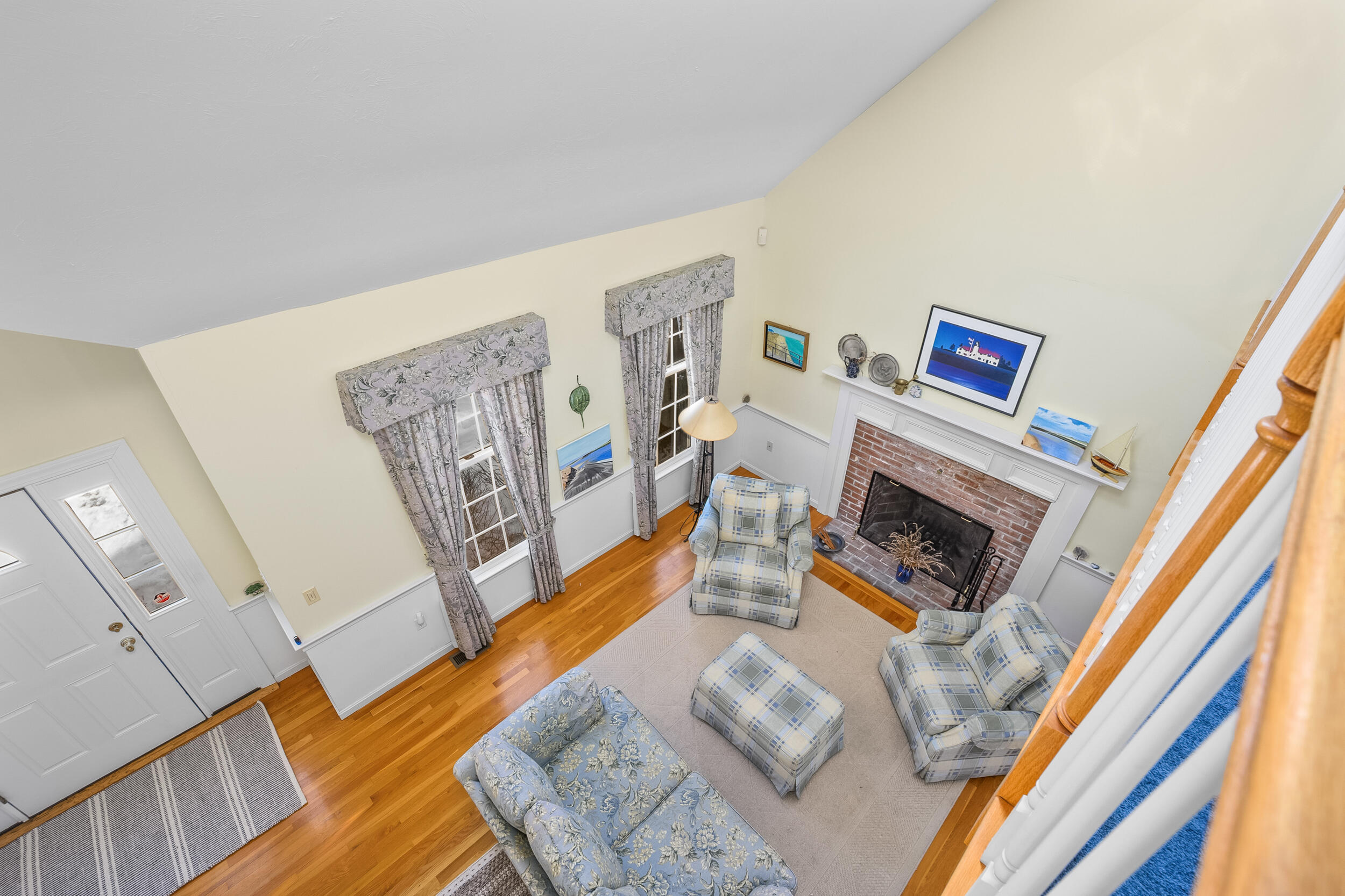 39 Jedidiah Way Chatham, MA 02633 - Photo 11 of 47 a living room with furniture and a fireplace