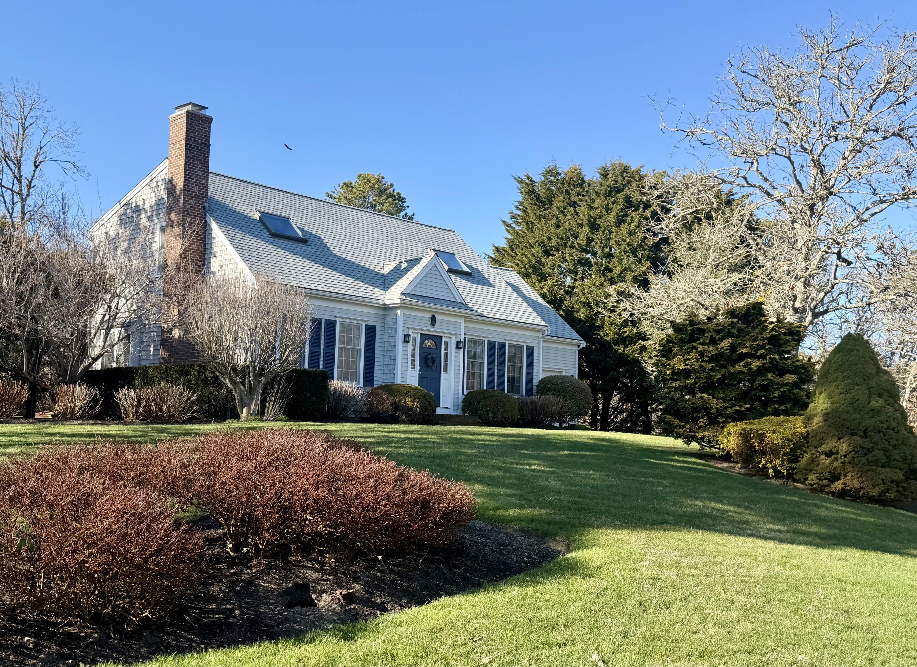 39 Jedidiah Way Chatham, MA 02633 - Photo 3 of 47 a front view of a house with a yard