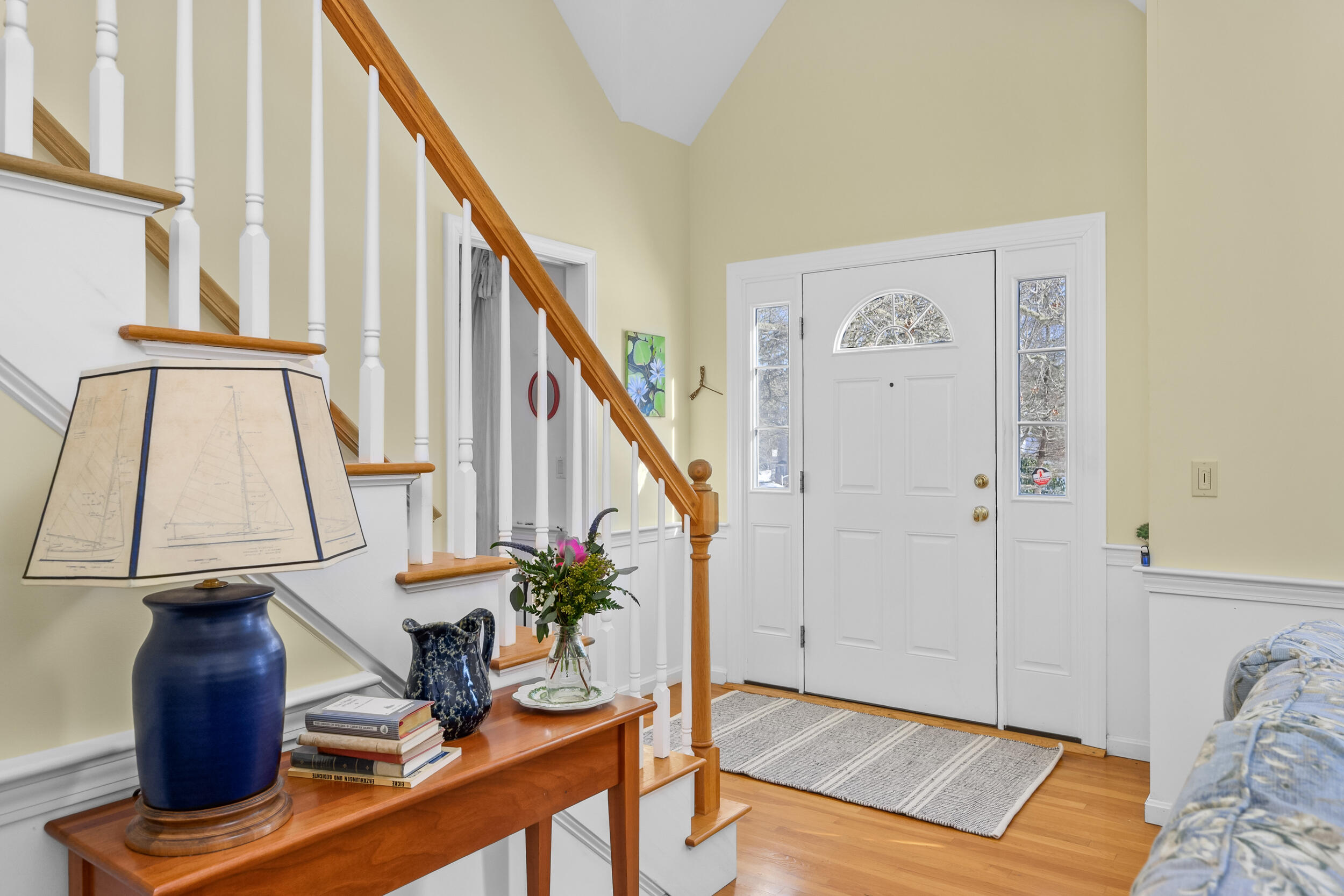 39 Jedidiah Way Chatham, MA 02633 - Photo 8 of 47 a view of an entryway with wooden floor and stairs