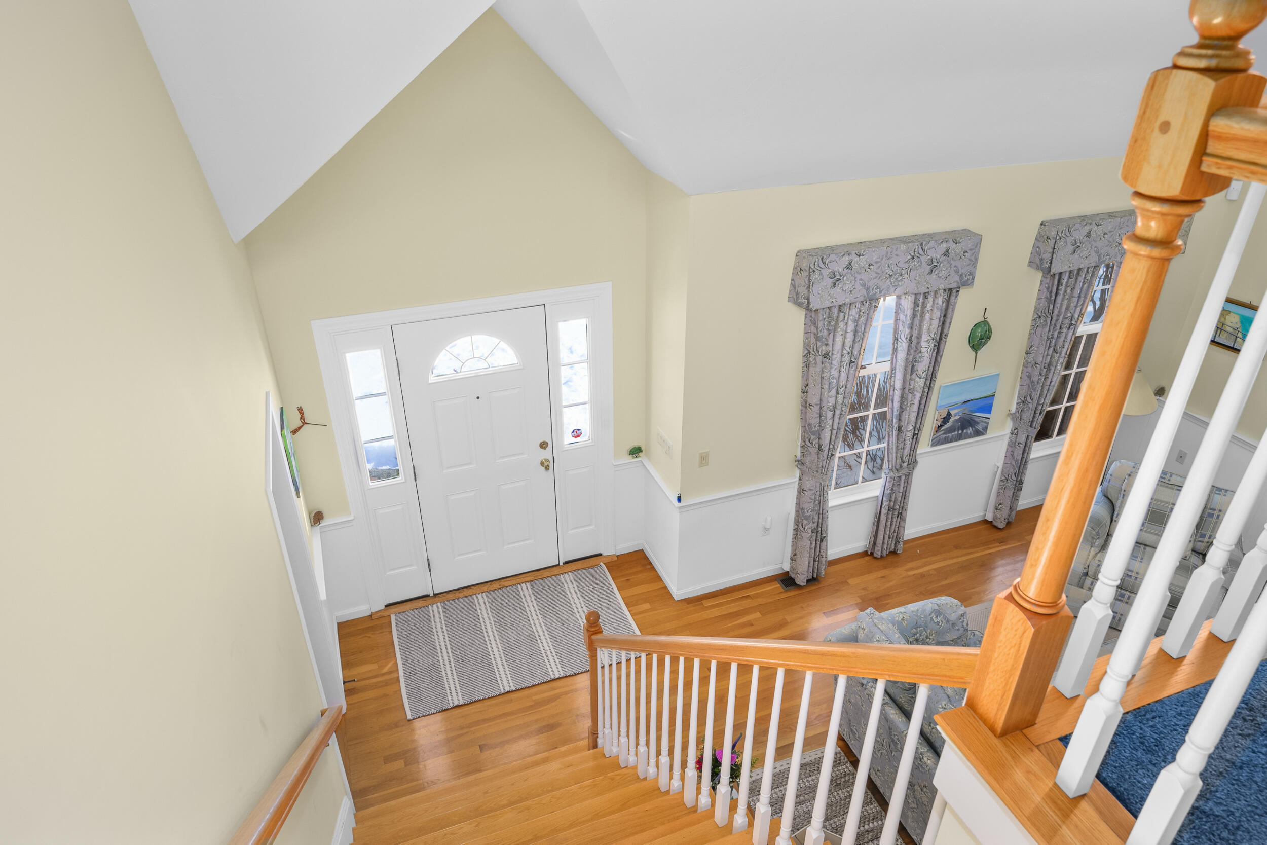 39 Jedidiah Way Chatham, MA 02633 - Photo 9 of 47 a view of a hallway with wooden floor and staircase