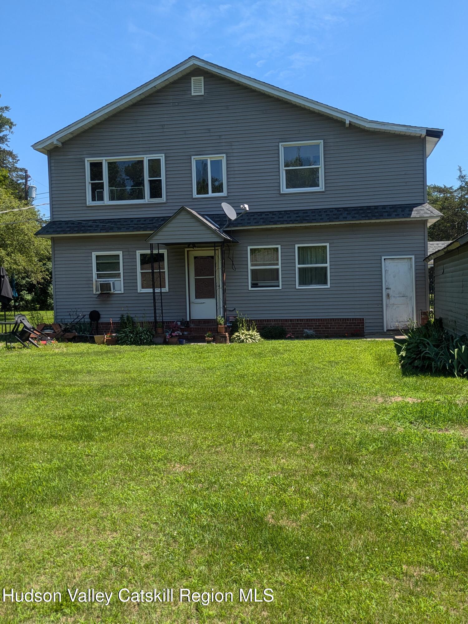57 Samsonville Road Kerhonkson, NY 12446 - Photo 3 of 25 a front view of house with yard and trees