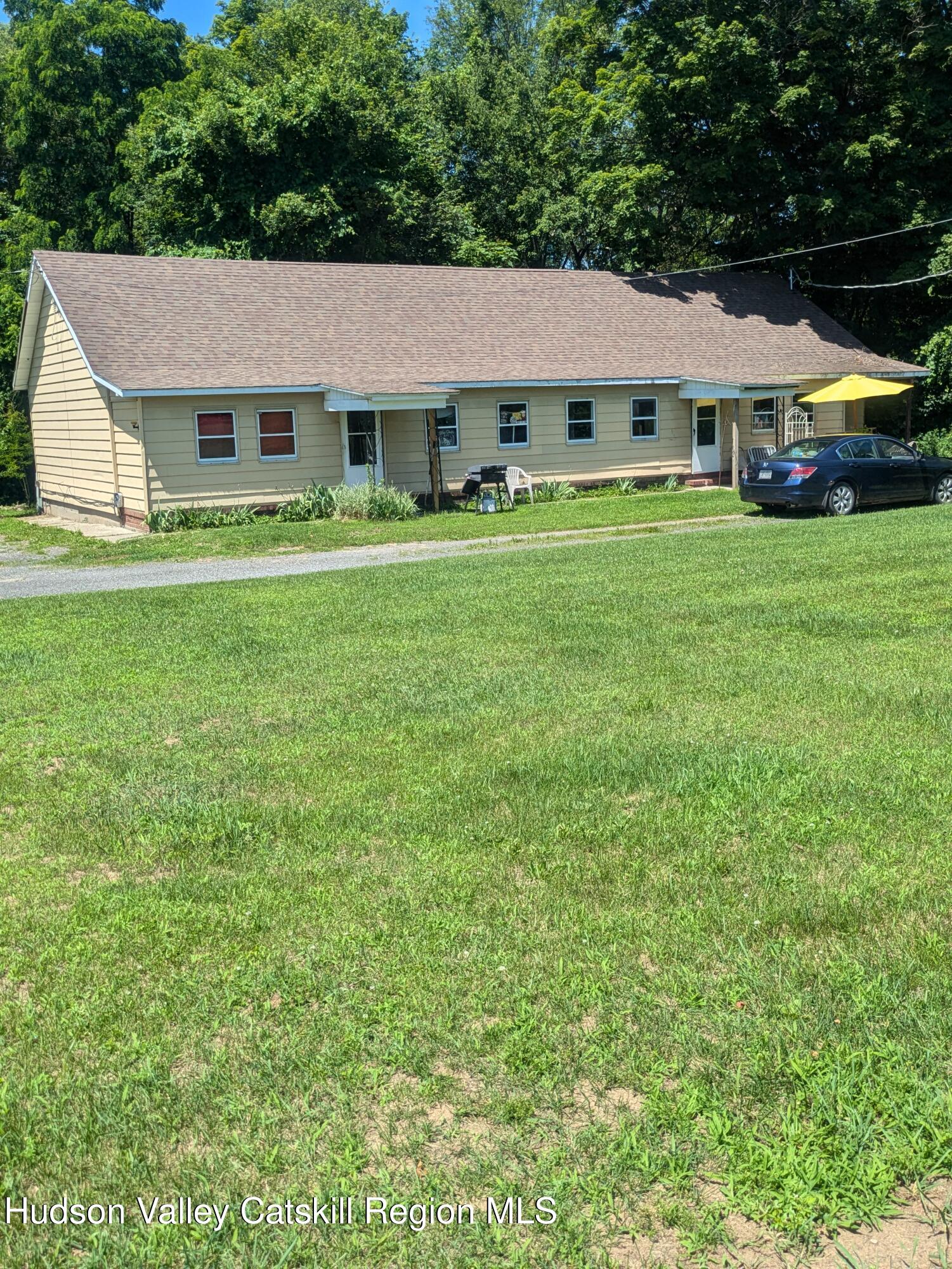57 Samsonville Road Kerhonkson, NY 12446 - Photo 8 of 25 a front view of a house with garden