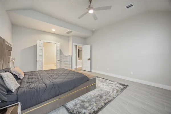 a bathroom with a bathtub and a sink