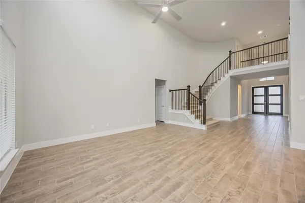 a view of kitchen with furniture and wooden floor