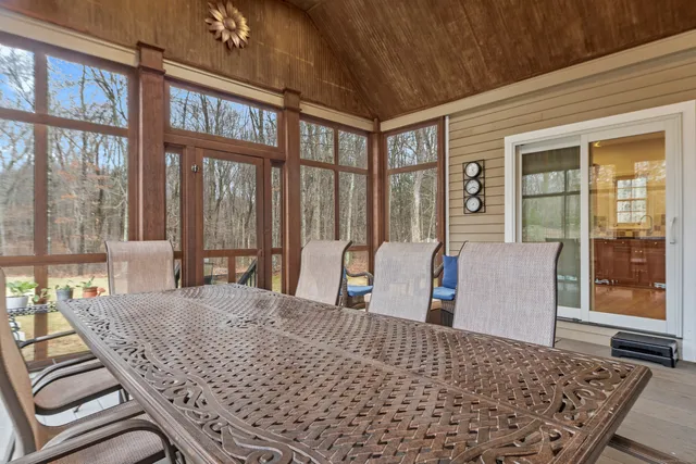 a view of a living room and dining room