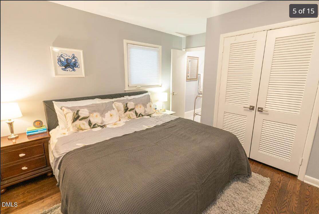 633 Stacy Street Raleigh, NC 27607 - Photo 5 of 17 a bedroom with a bed and a window