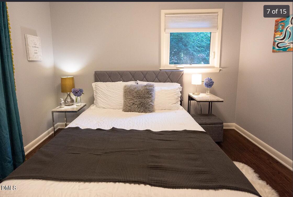 633 Stacy Street Raleigh, NC 27607 - Photo 7 of 17 a bedroom with a bed and window