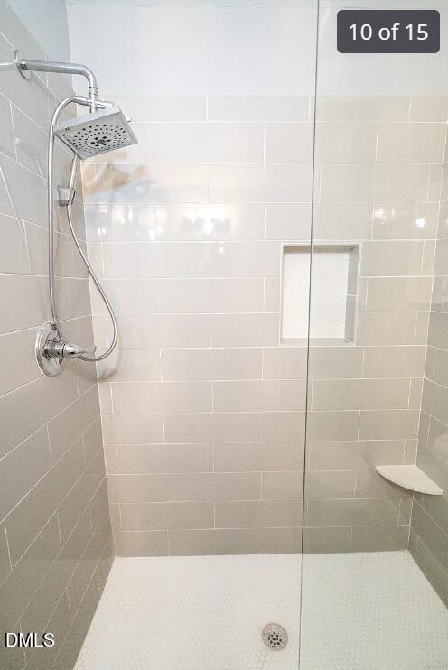 633 Stacy Street Raleigh, NC 27607 - Photo 10 of 17 a bathroom with a shower