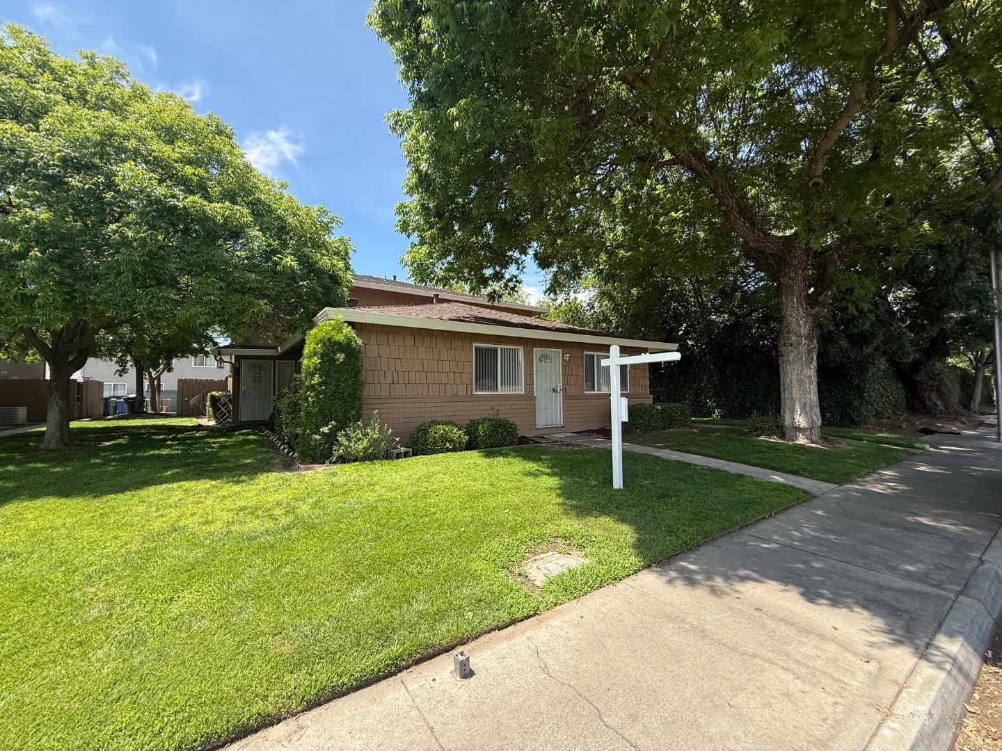 2505 Prescott Road, Unit 1 Modesto, CA 95350 - Photo 2 of 42 a view of a house with a yard