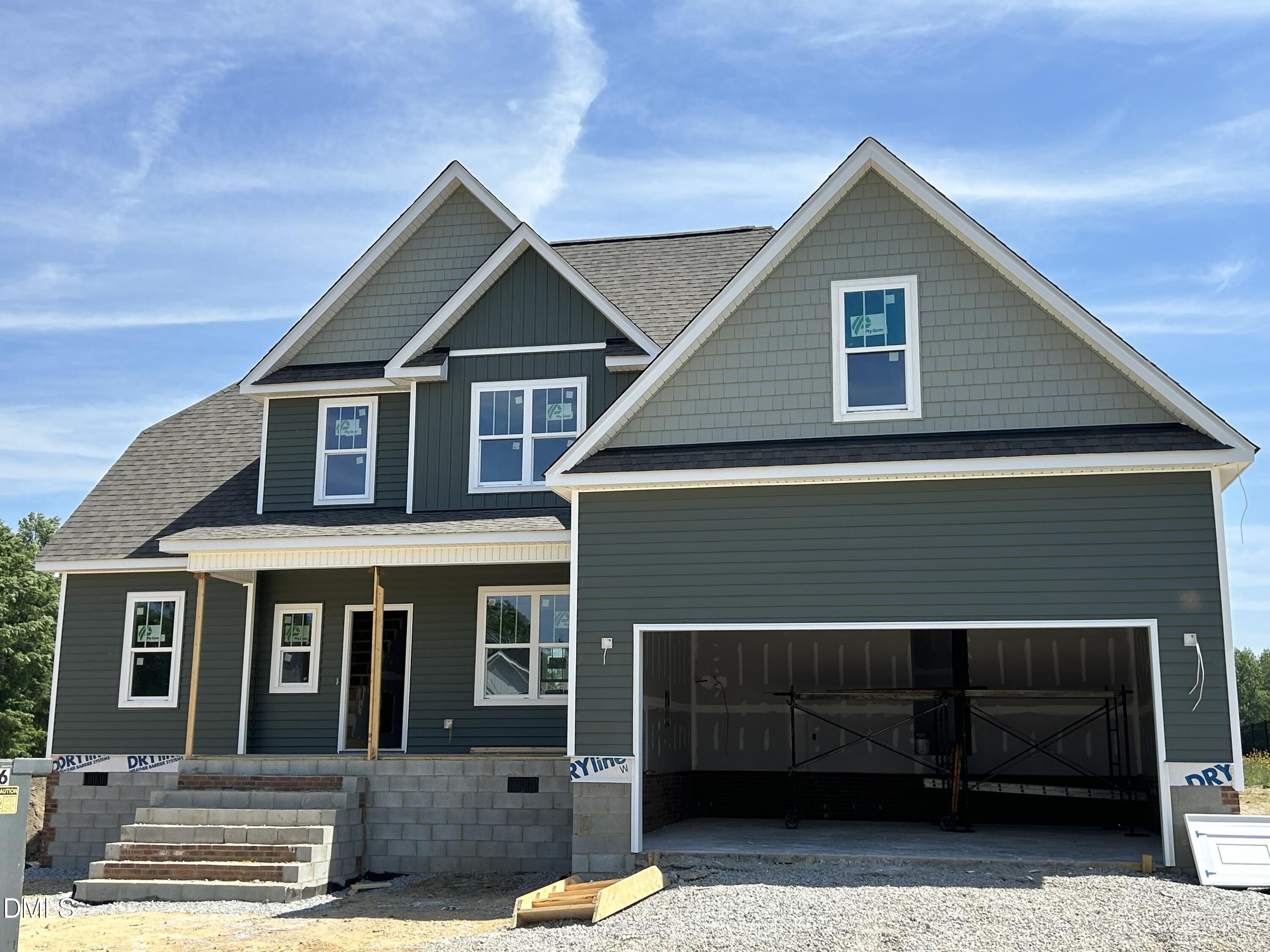 168 Prency Lane Middlesex, NC 27557 - Photo 1 of 15 a front view of a house with a garage