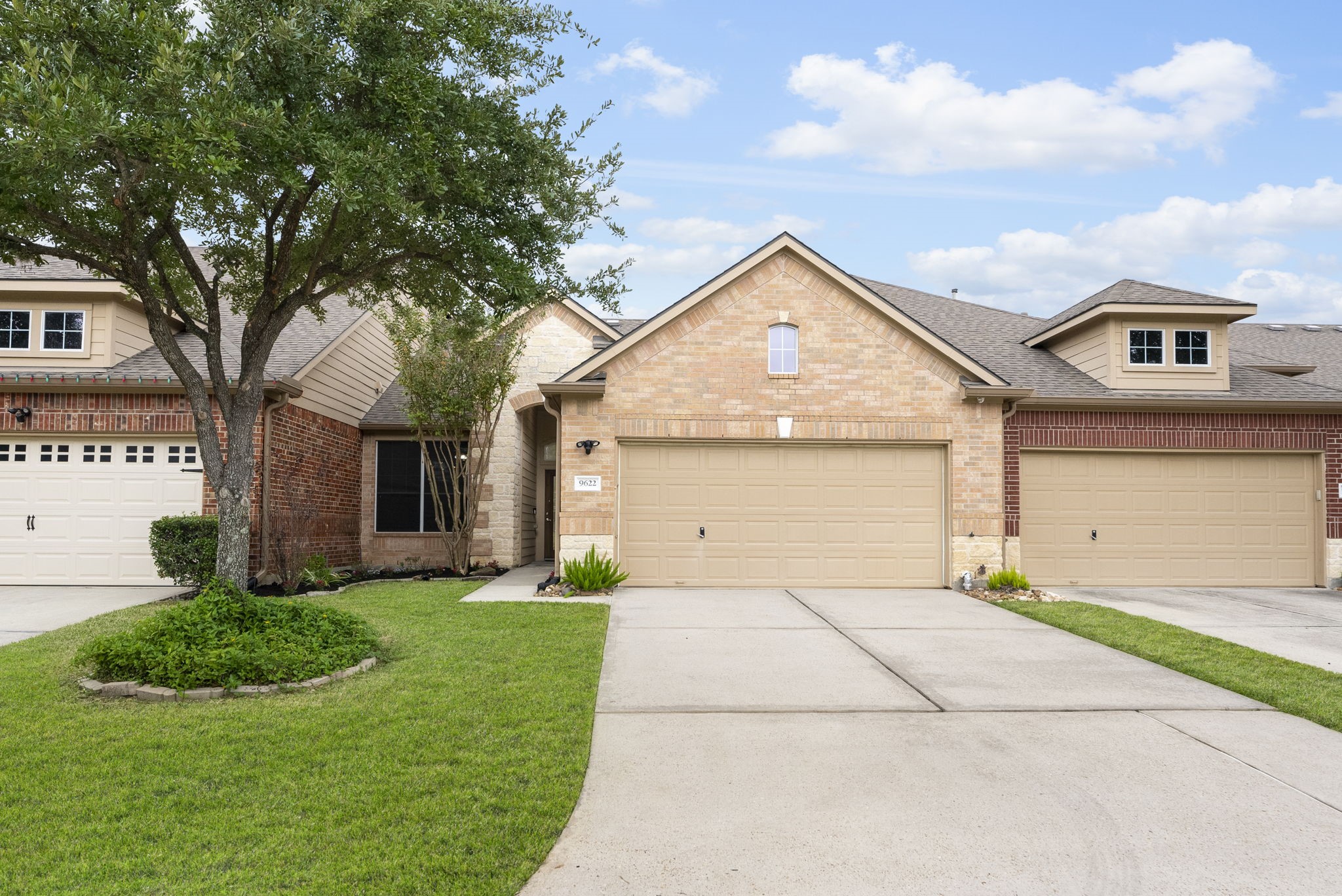 9622 Old Timber Lane Spring, TX 77379 - Photo 50 of 50 a front view of a house with garden