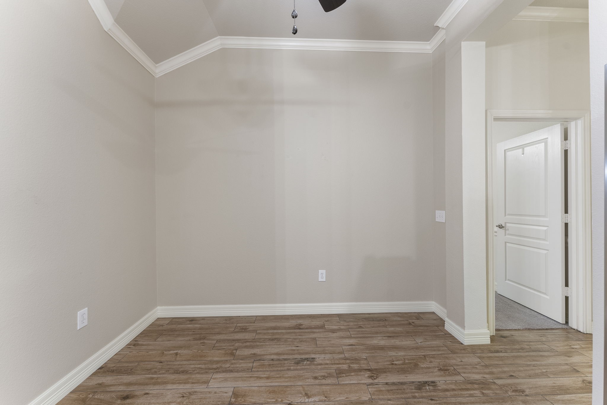 9622 Old Timber Lane Spring, TX 77379 - Photo 18 of 50 a view of an empty room with wooden floor and closet