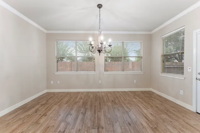 an aerial view of a city with lots of residential buildings