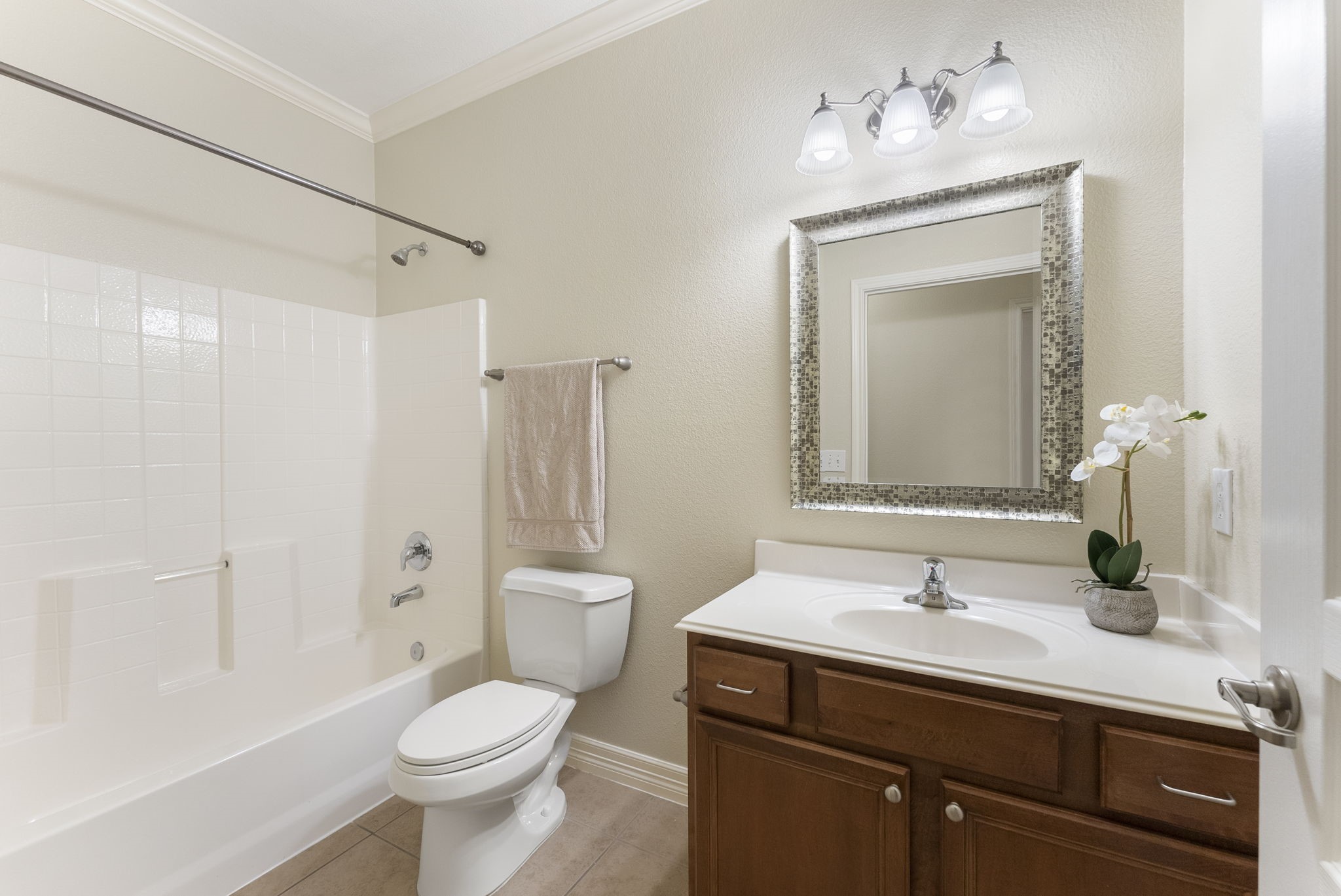 9622 Old Timber Lane Spring, TX 77379 - Photo 29 of 50 a bathroom with a sink toilet a mirror and shower
