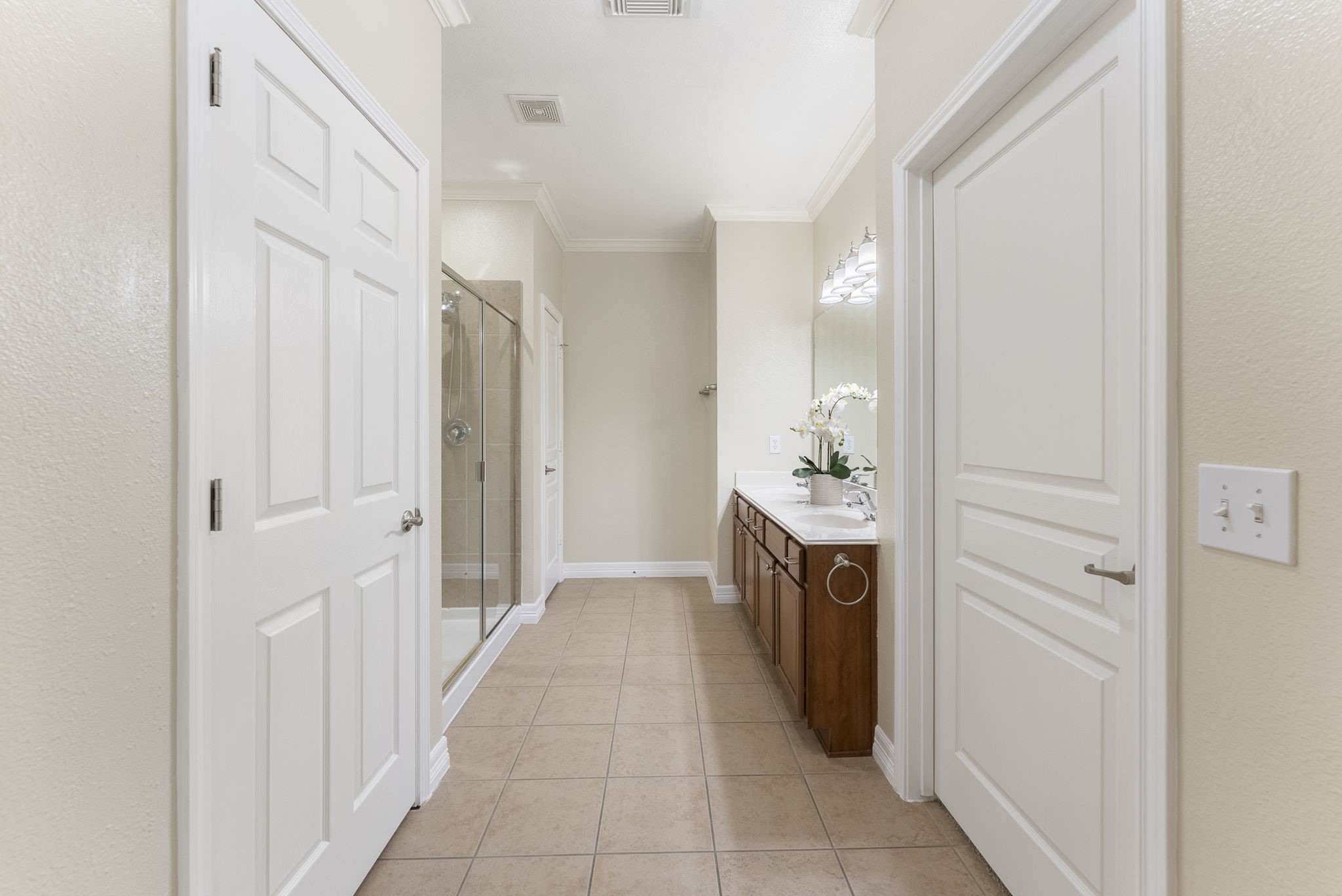 9622 Old Timber Lane Spring, TX 77379 - Photo 38 of 50 a bathroom with a sink a mirror and a shower