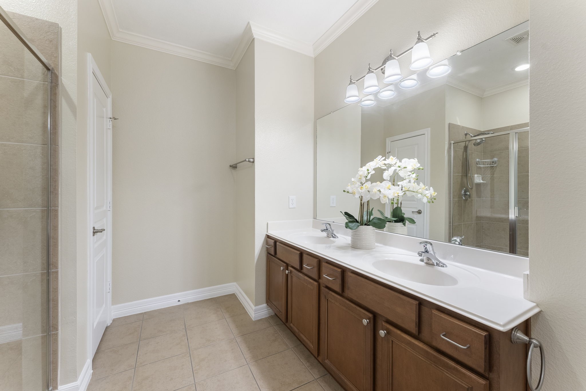 9622 Old Timber Lane Spring, TX 77379 - Photo 40 of 50 a bathroom with a sink vanity and a mirror