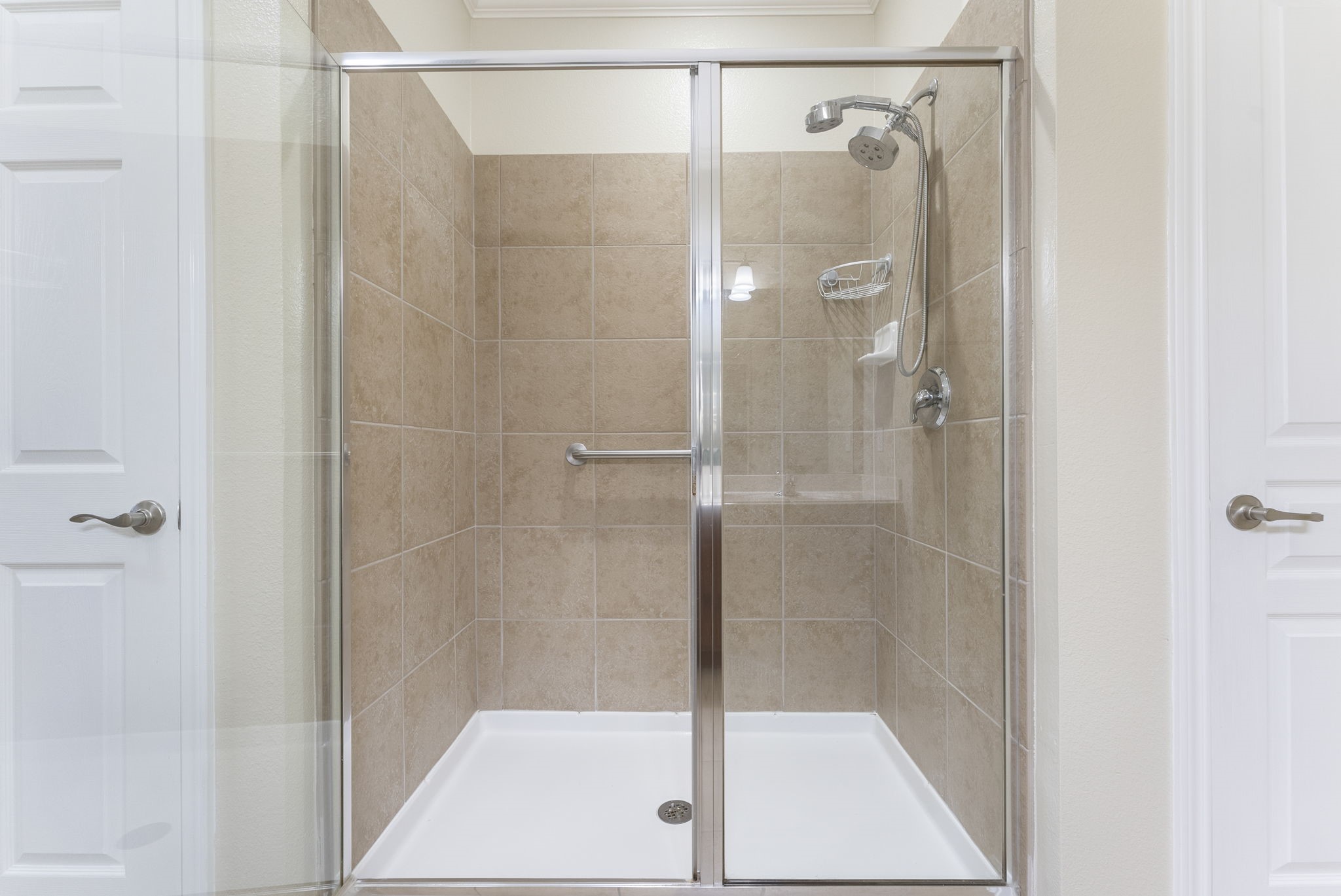 9622 Old Timber Lane Spring, TX 77379 - Photo 44 of 50 a bathroom with a glass shower door