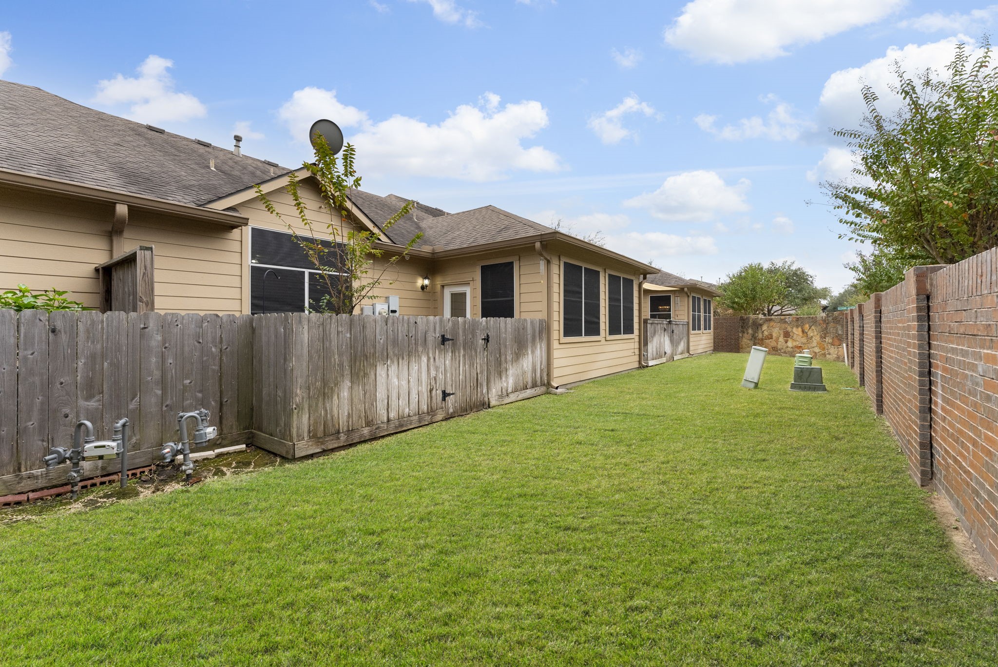 9622 Old Timber Lane Spring, TX 77379 - Photo 46 of 50 a view of a house with yard and a garden