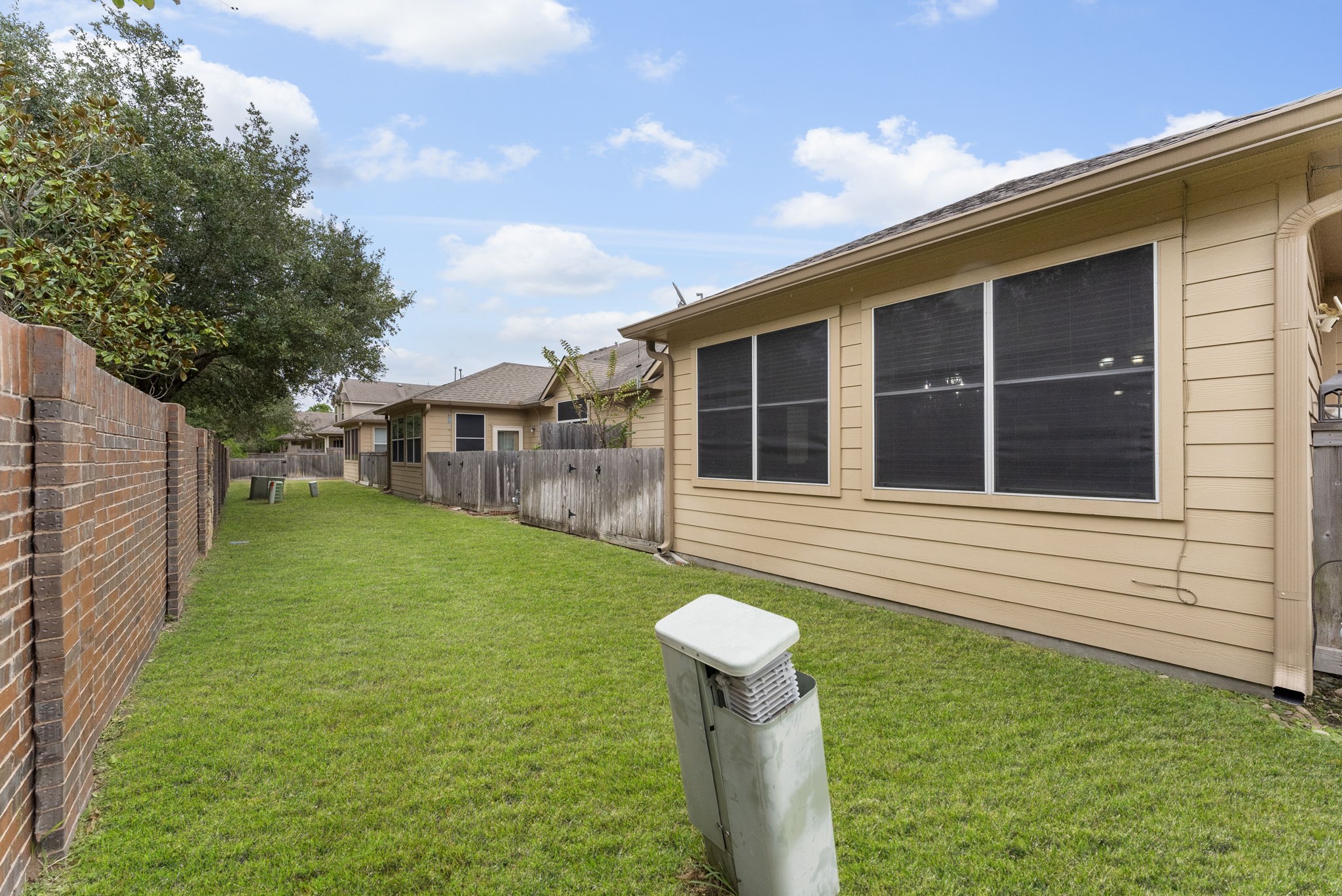 9622 Old Timber Lane Spring, TX 77379 - Photo 47 of 50 a front view of a house with a garden