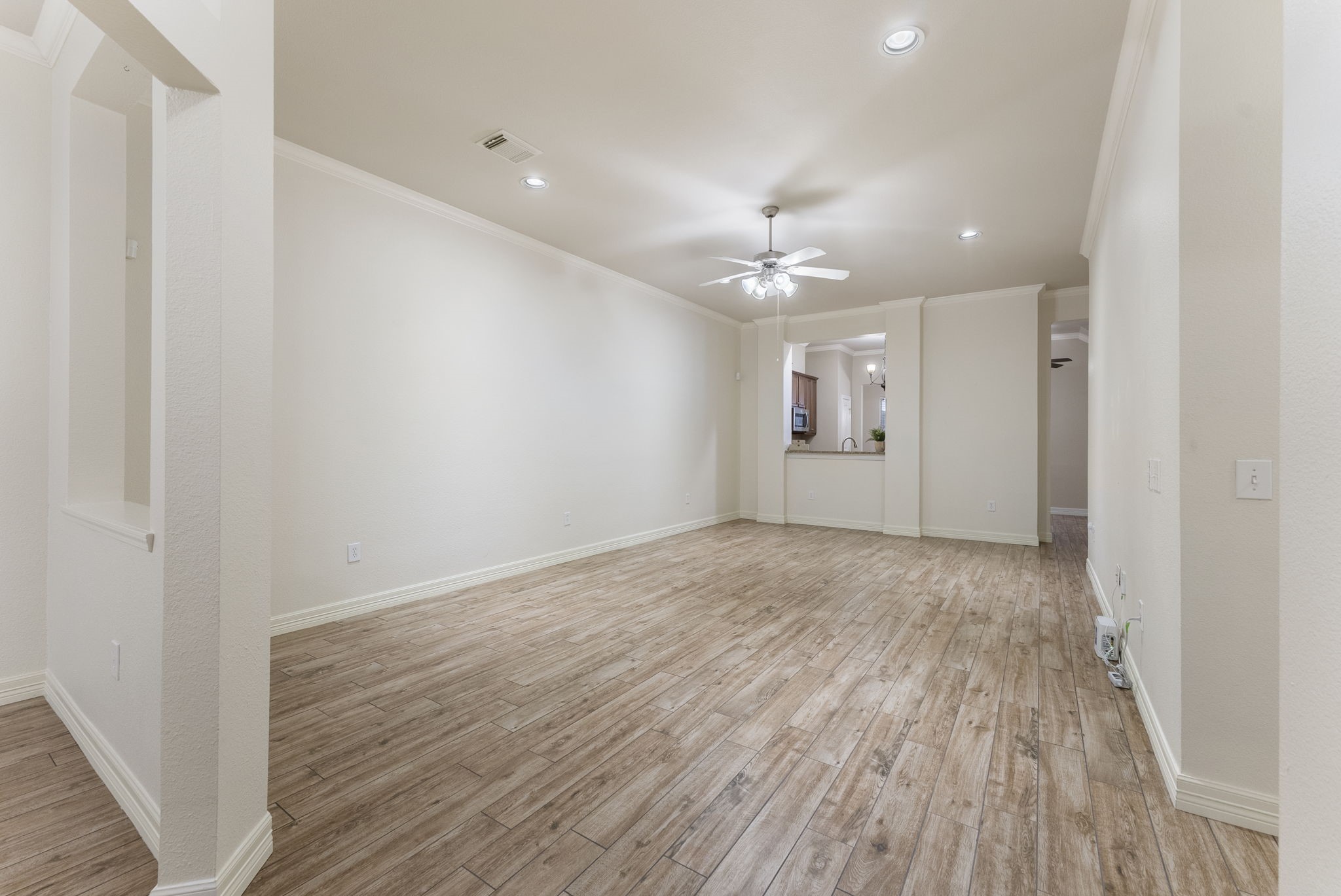 9622 Old Timber Lane Spring, TX 77379 - Photo 6 of 50 wooden floor in an empty room with a window