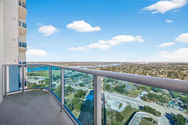 a view of roof deck with furniture