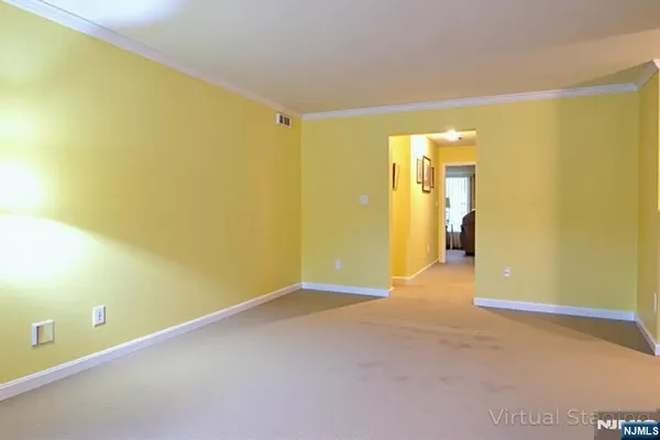 a view of a big room with wooden floor