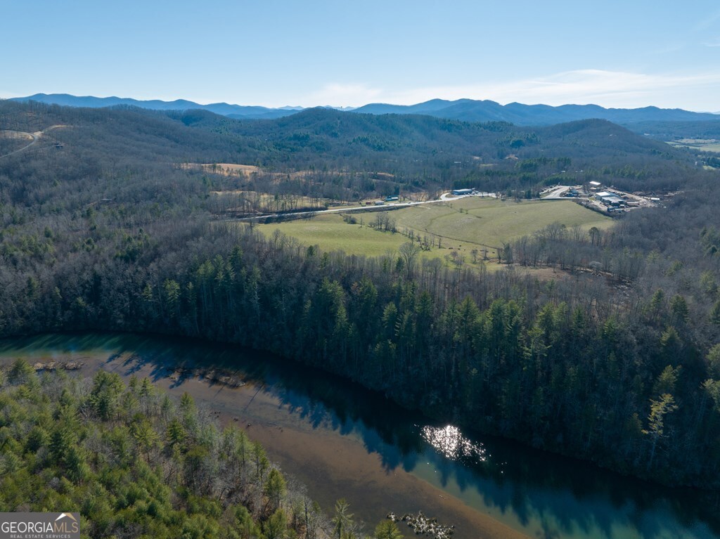 Lot 19 Mission Ridge Drive Hayesville, NC 28904 - Photo 33 of 44 a view of a lake in middle of forest