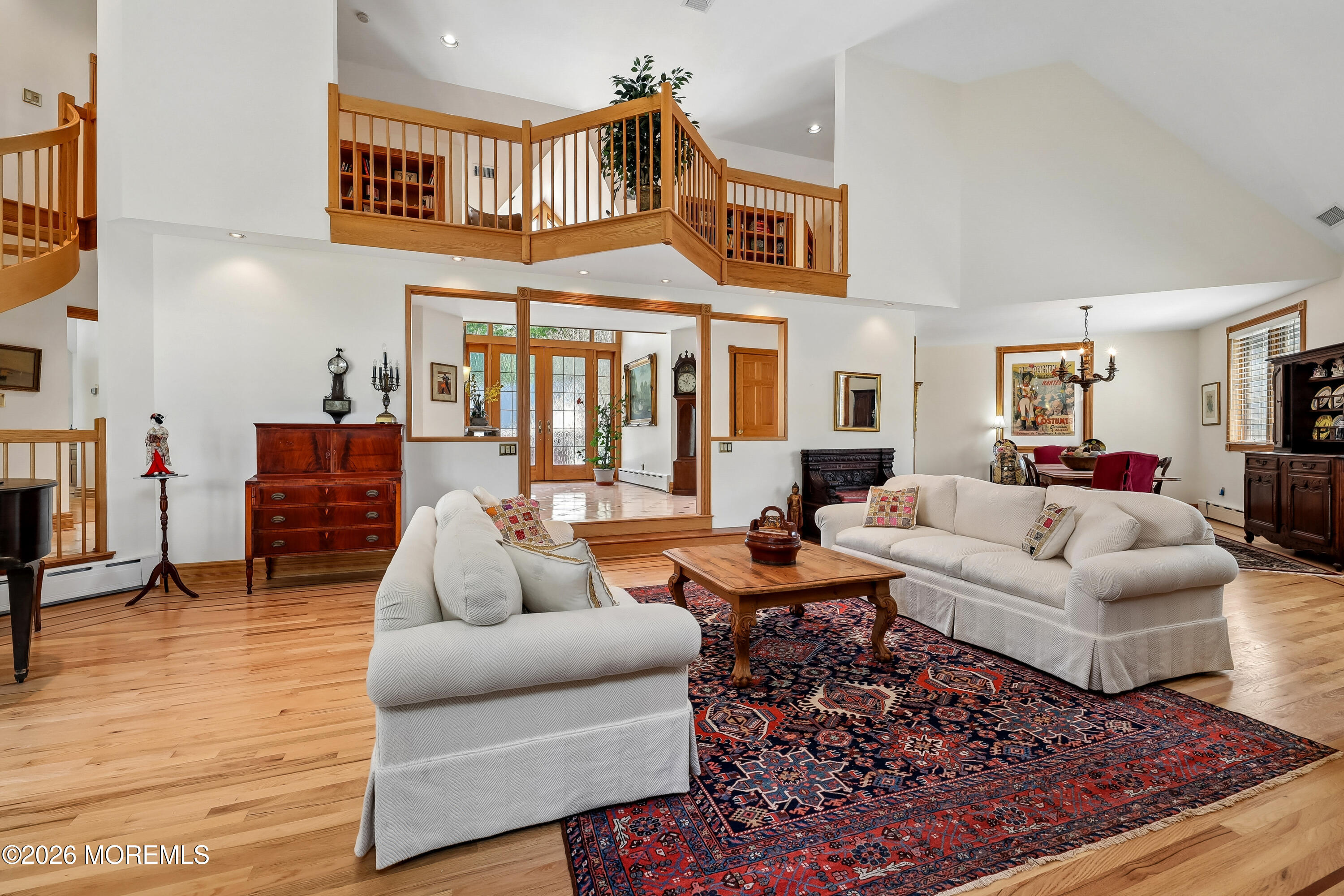 187 Hockhockson Road Colts Neck, NJ 07722 - Photo 13 of 55 a living room with furniture a rug and a fireplace