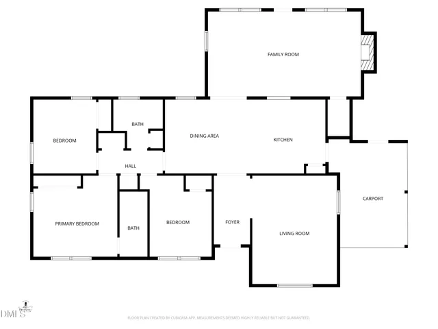 a view of a house with a yard covered in the forest