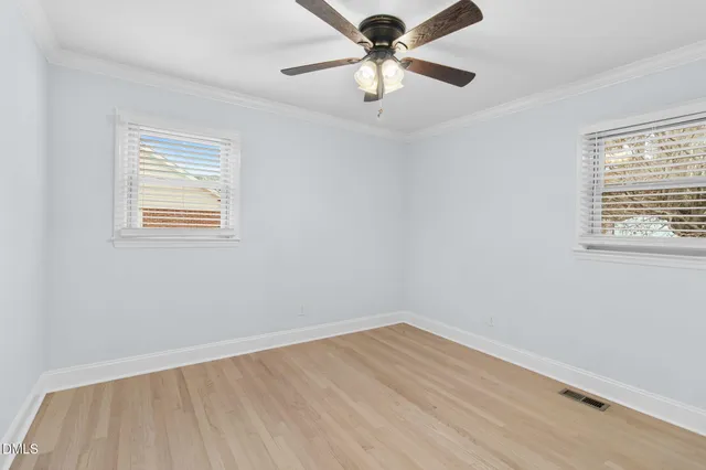 a bathroom with a shower and a bath tub
