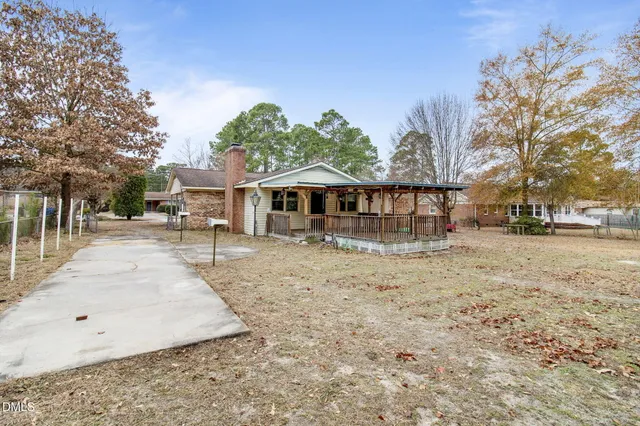 a view of outdoor space with wooden deck