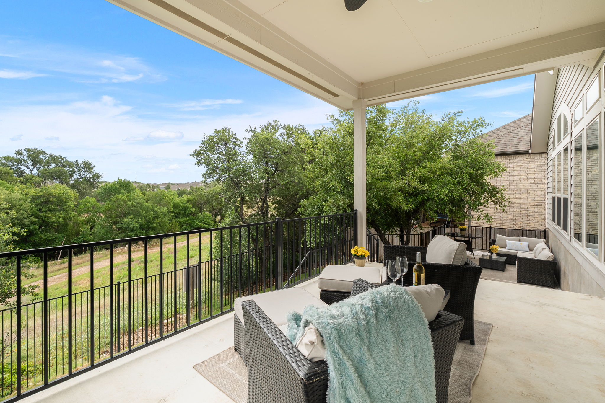 1908 Woolsey Way Leander, TX 78641 - Photo 22 of 36 A spacious covered patio provides a serene outdoor space with spectacular views.