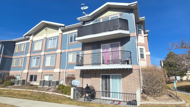 90 East Resaca Drive, Unit C11 Sandy, UT 84070 - Photo 1 of 27 View of apartment building / complex