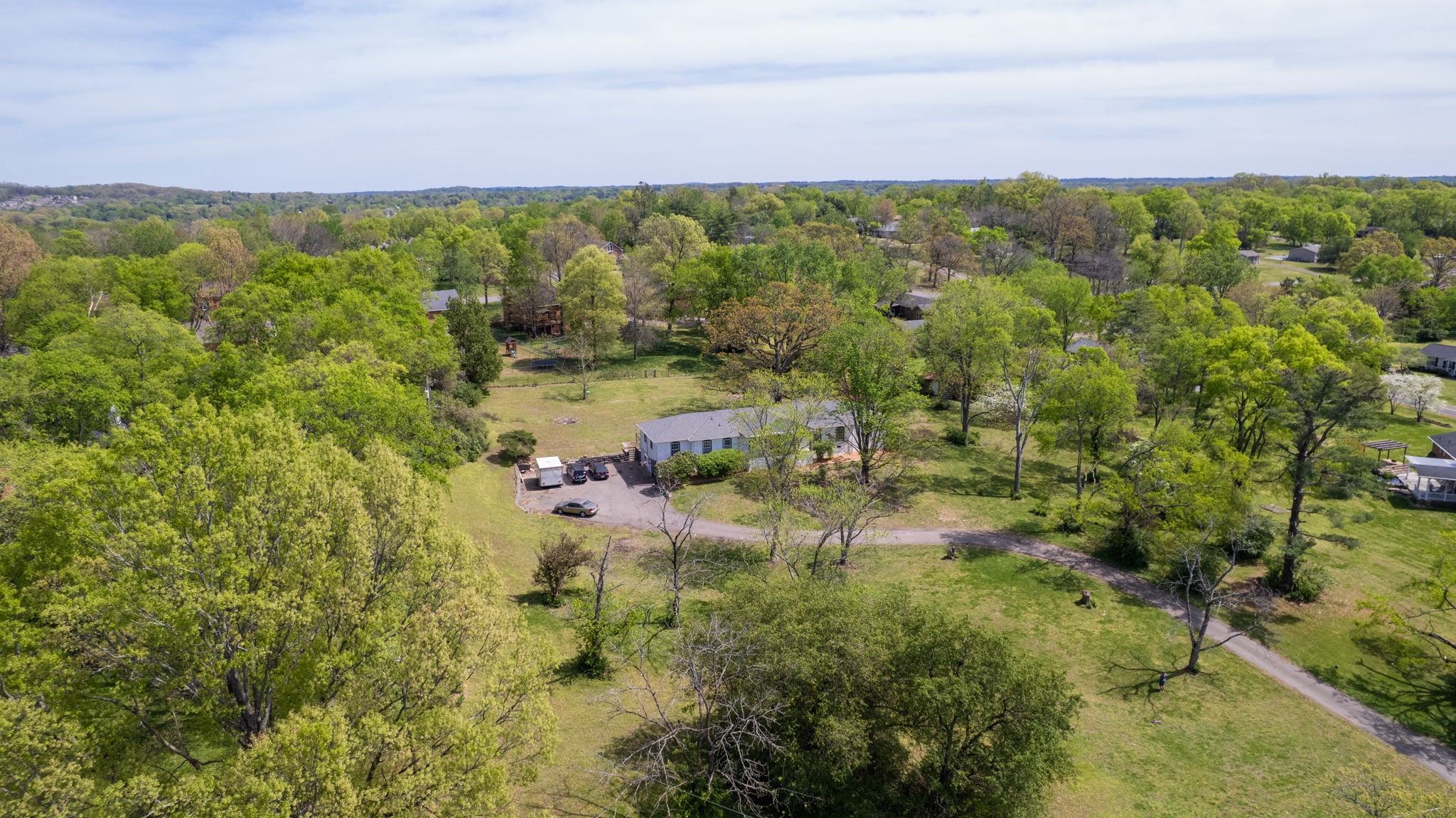 463 Walton Ferry Road Hendersonville, TN 37075 - Photo 49 of 54 a view of a lake with green field